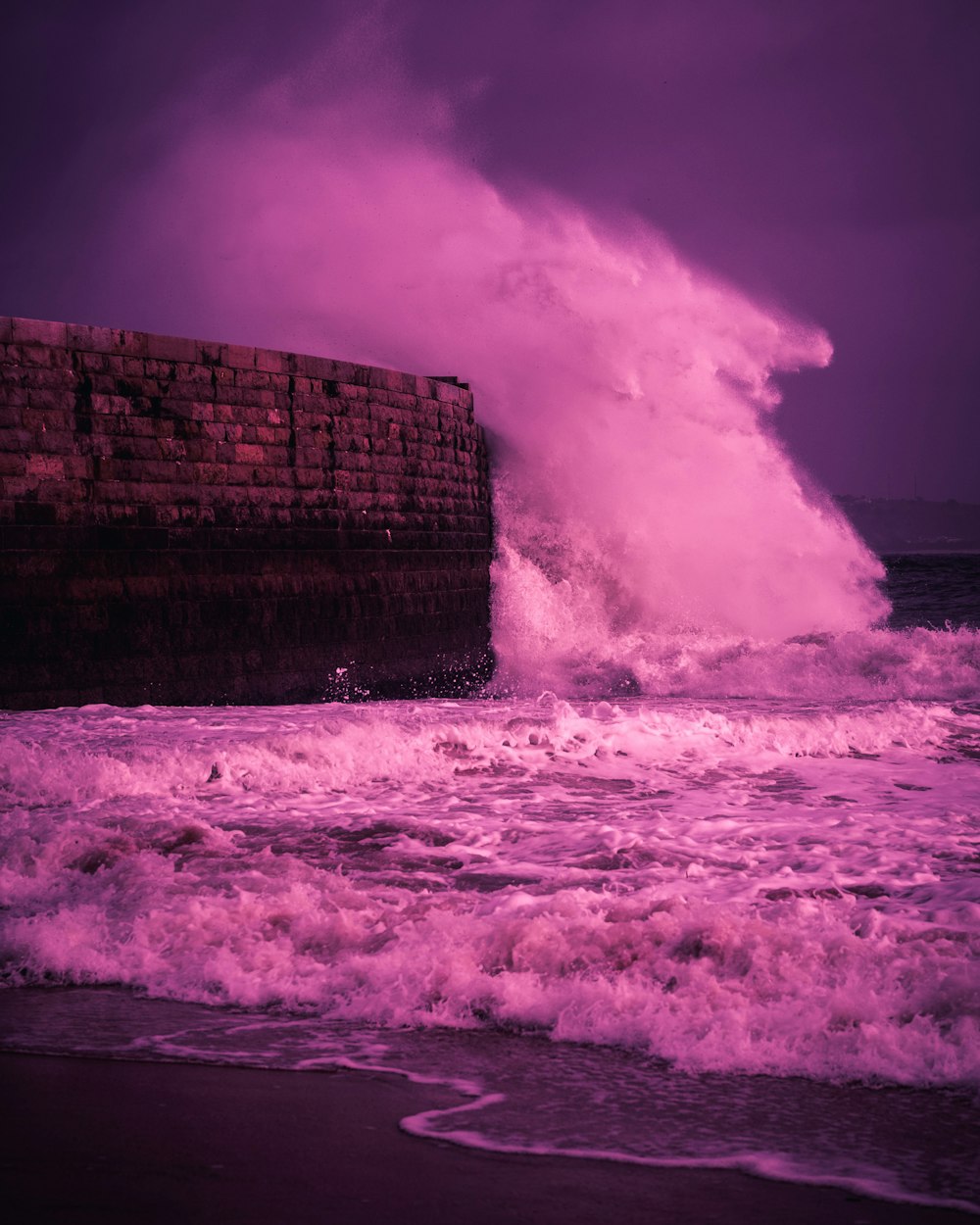 ocean waves crashing on rocks