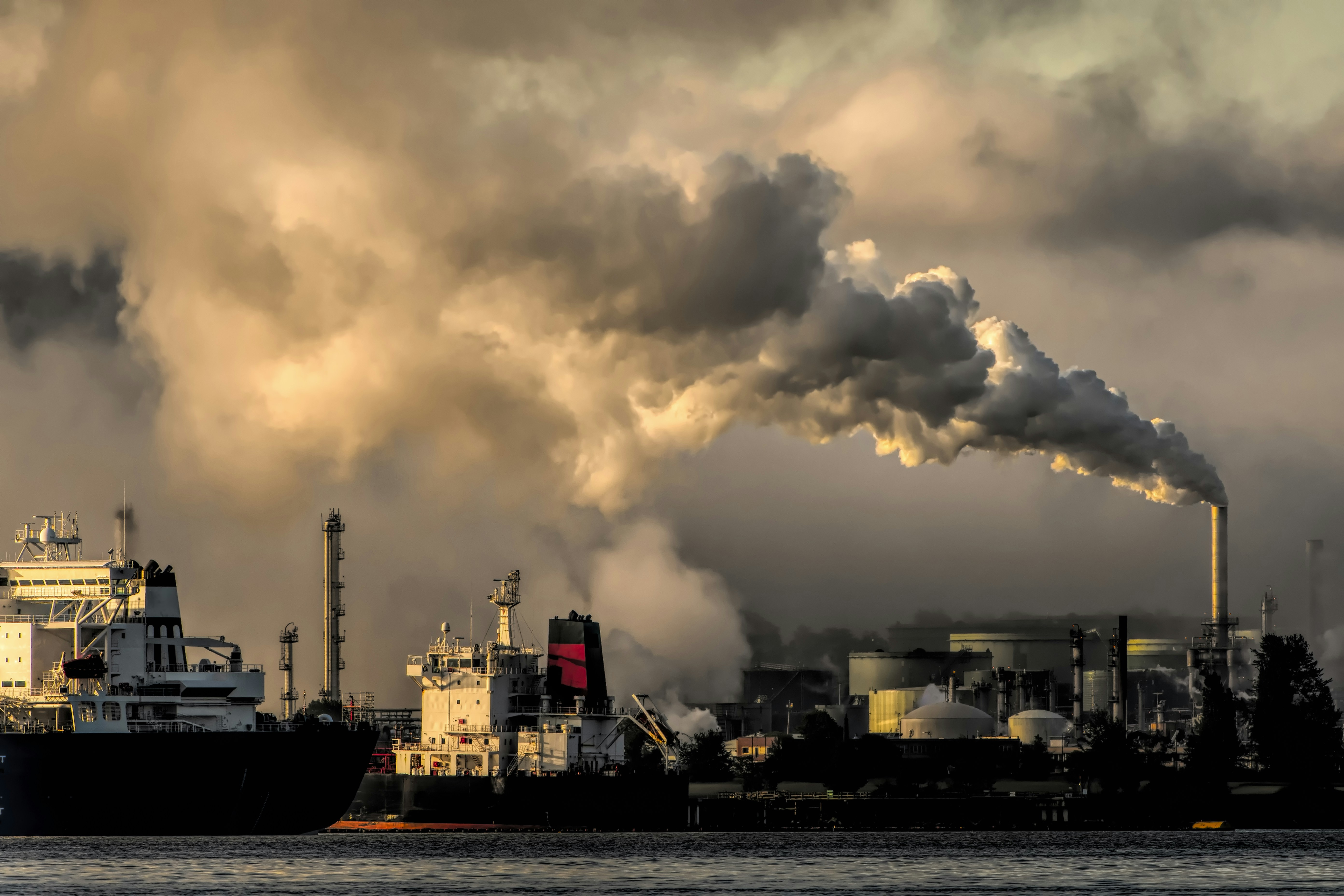 Industrial chimneys emitting smoke