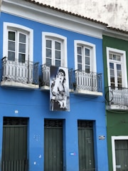 Exterior of a renovated commercial building with bold blue and white paint.