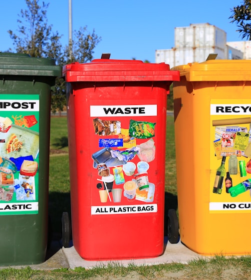 red yellow and green trash bins