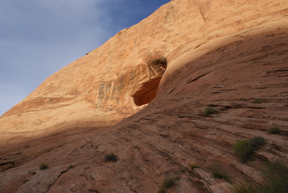 brown rock formation under blue sky during daytime