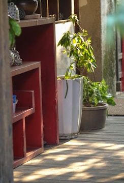 Bright prank items scattered on a wooden floor.