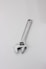 silver steel tool on white surface