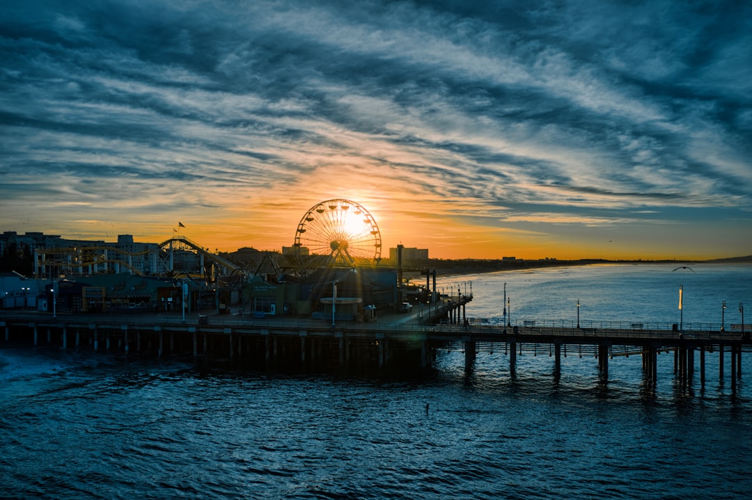 ferris wheel on dock during sunset