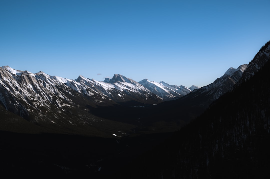 snow covered mountain under blue sky during daytime