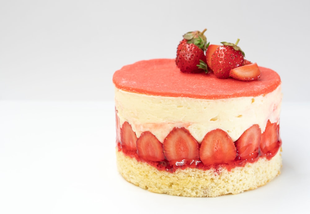 strawberry cake on white surface