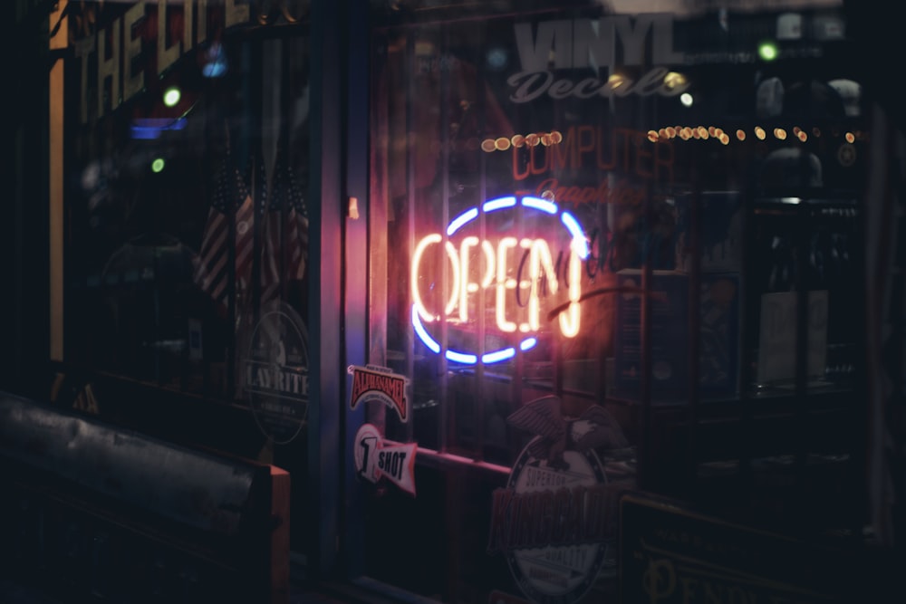 red and white UNKs neon light signage