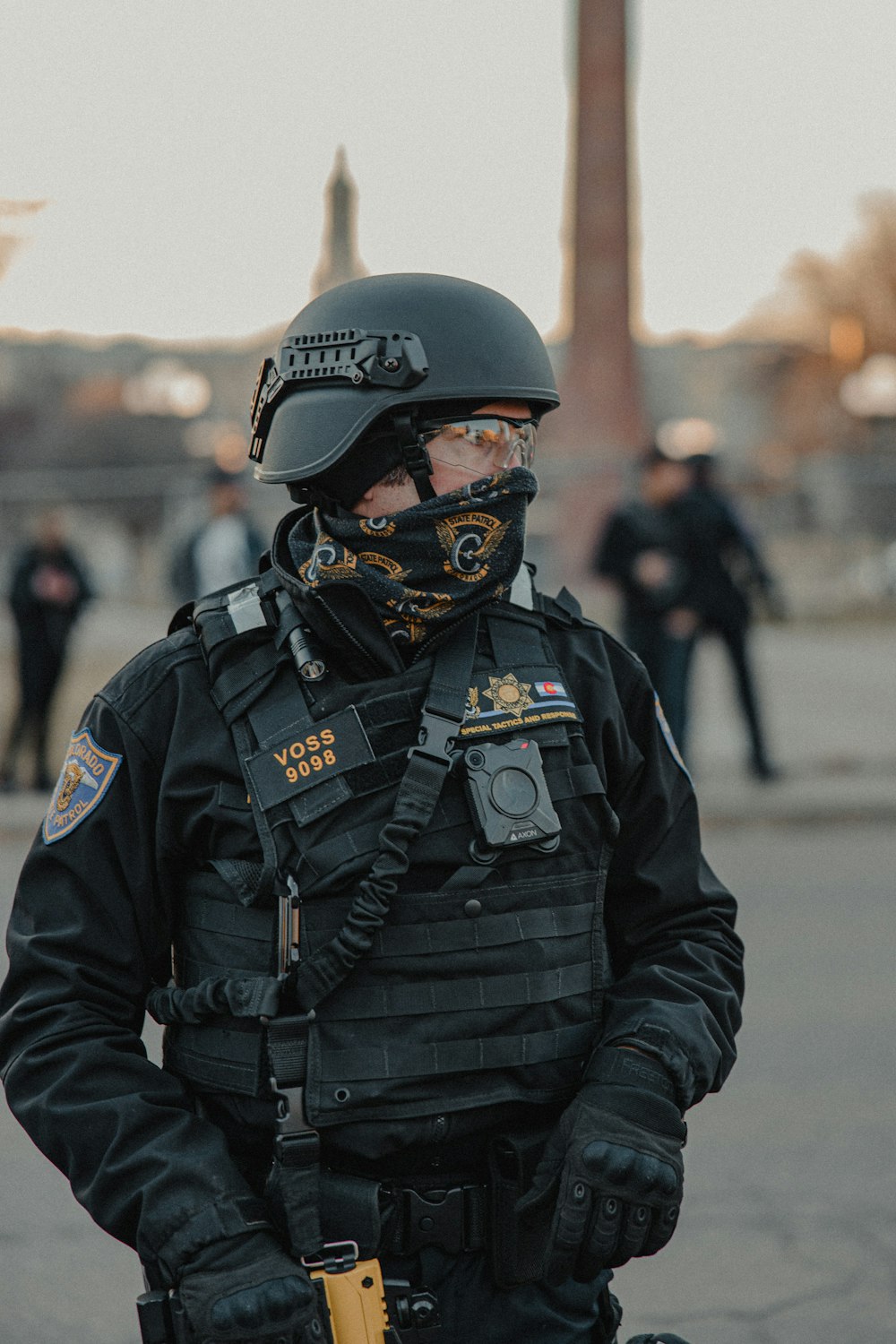 man in black leather jacket wearing black helmet