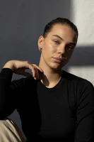 woman in black long sleeve shirt