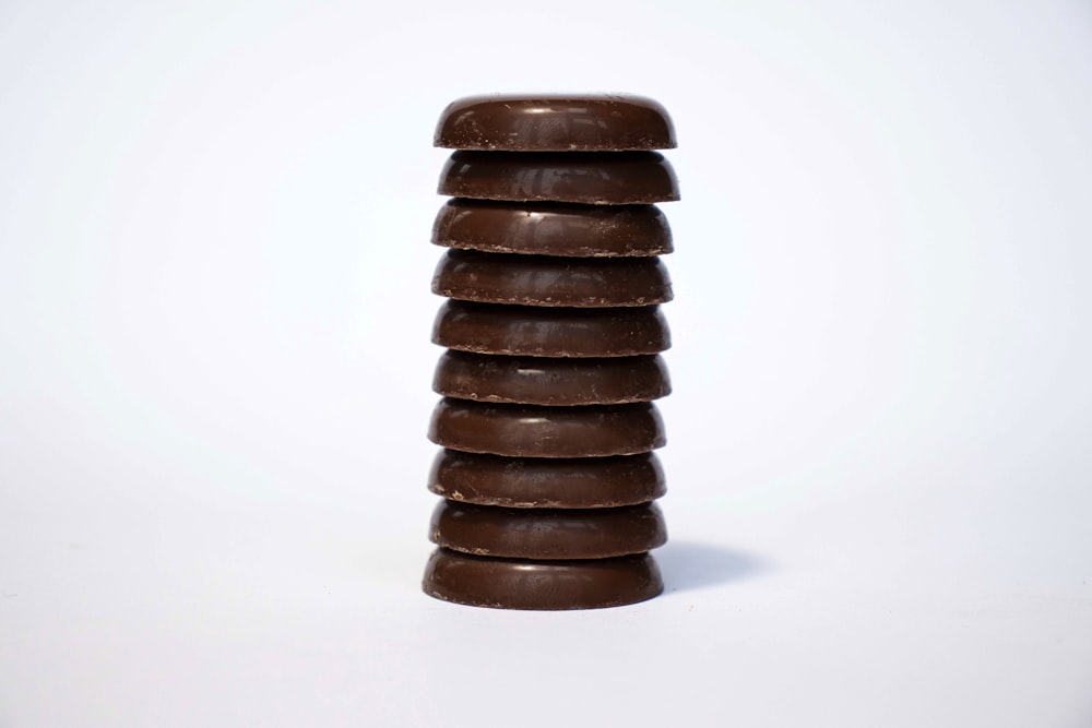 brown wooden cone on white background