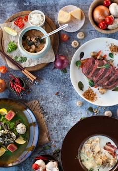 A beautifully arranged flat lay of vibrant food dishes showcasing various textures and colors.