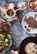 An elegant flat lay of gourmet dishes arranged artfully on a rustic wooden table.