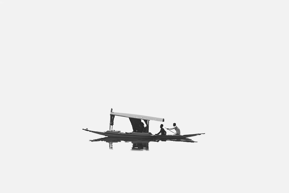 black and white airplane in mid air