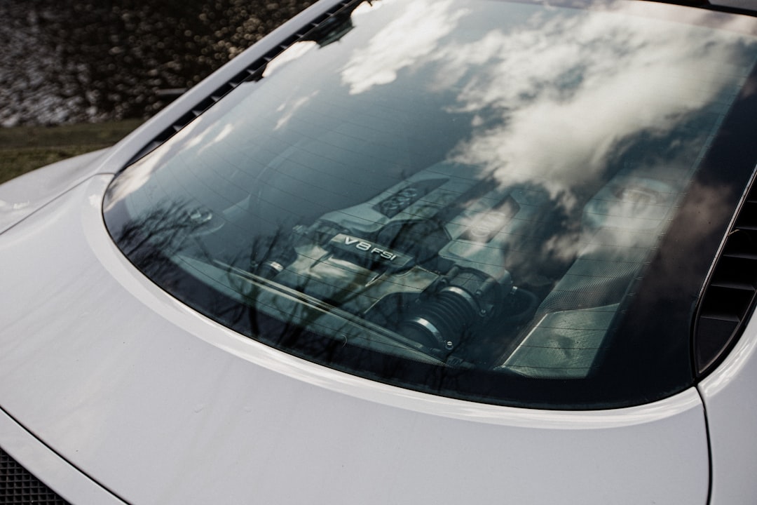 white car with open door,