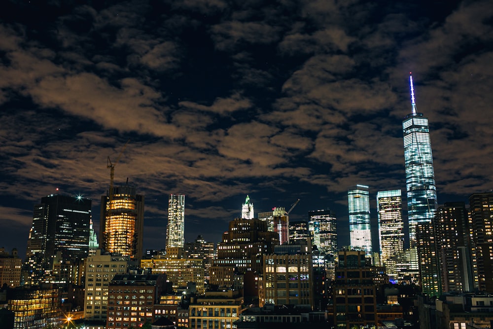 city skyline during night time