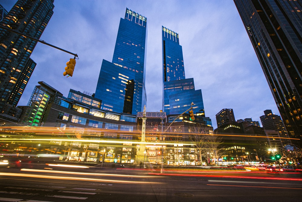 time lapse photography of city buildings during night time