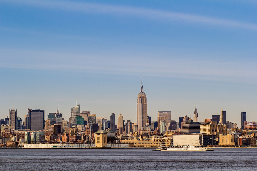 city skyline under blue sky during daytime