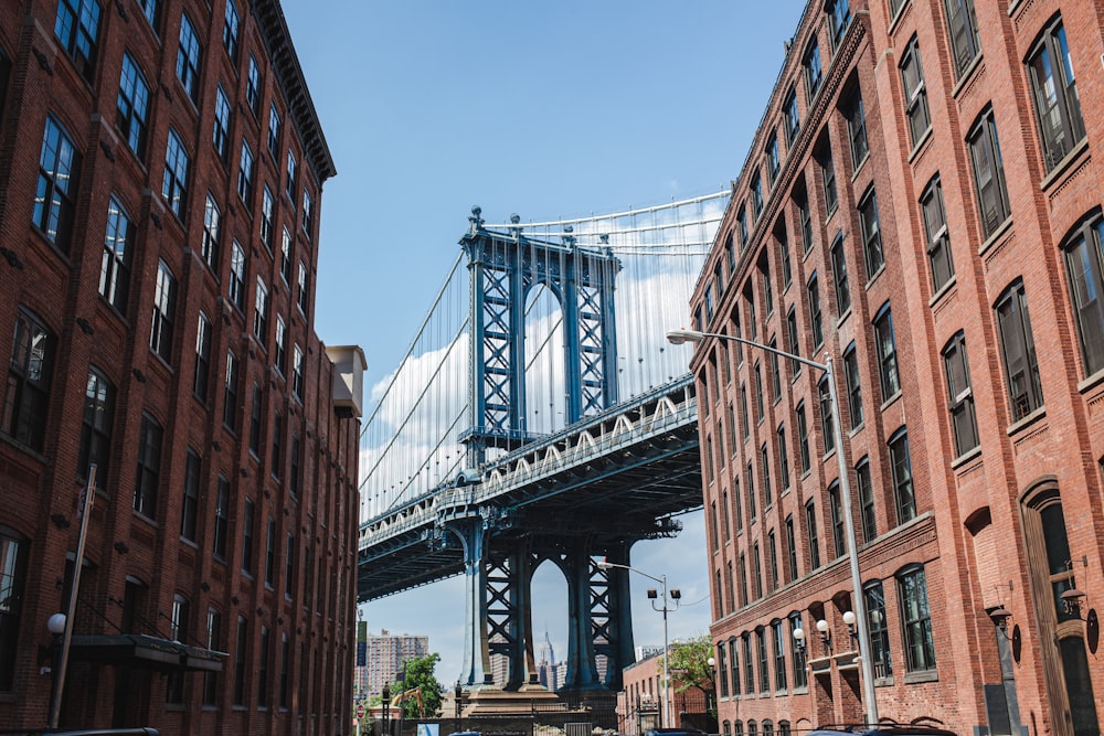 gray bridge under blue sky during daytime