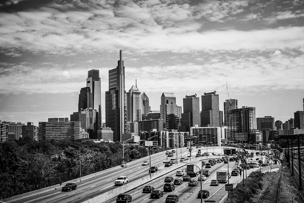 grayscale photo of city buildings