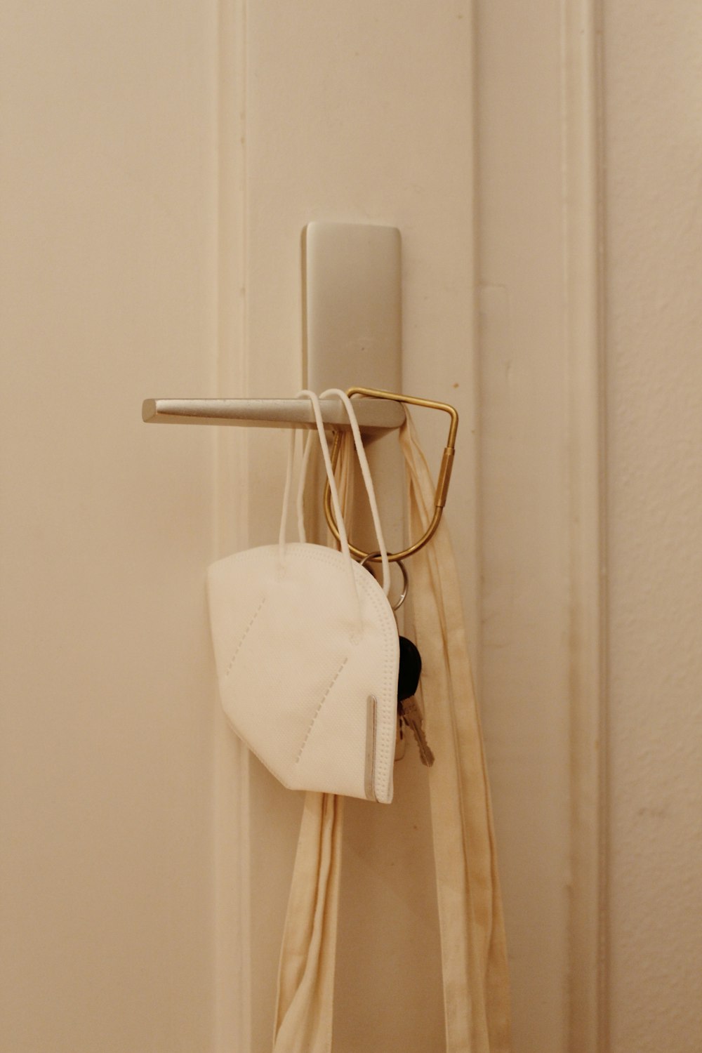 white towel on white metal rack