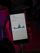 person holding black iphone 5