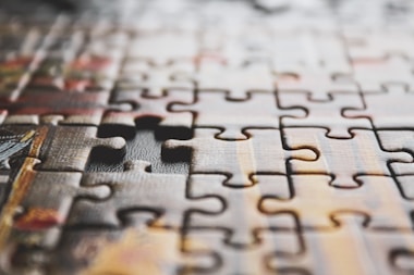 Jigsaw puzzle showing how a fractional COO aligns strategy, people, and operations