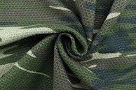 black and gray textile on white table