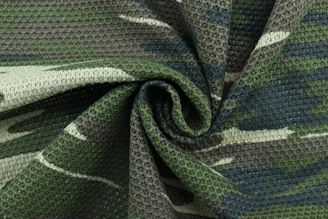 black and gray textile on white table