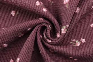 maroon and white floral textile