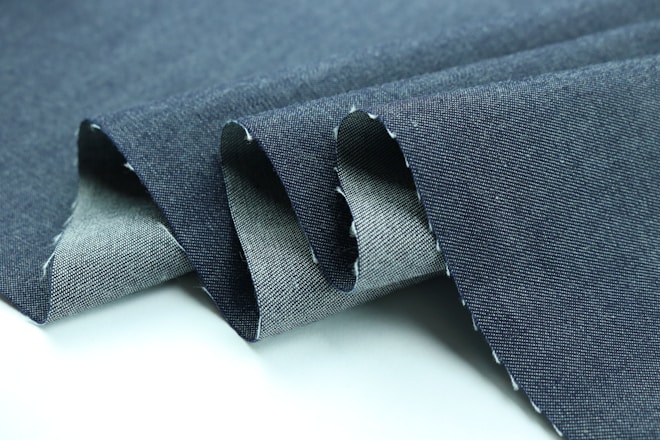 black strap on blue textile