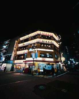 A neon-lit Tokyo street blending cyberpunk vibes with minimalist Japanese library aesthetics.