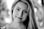 grayscale photo of womans face