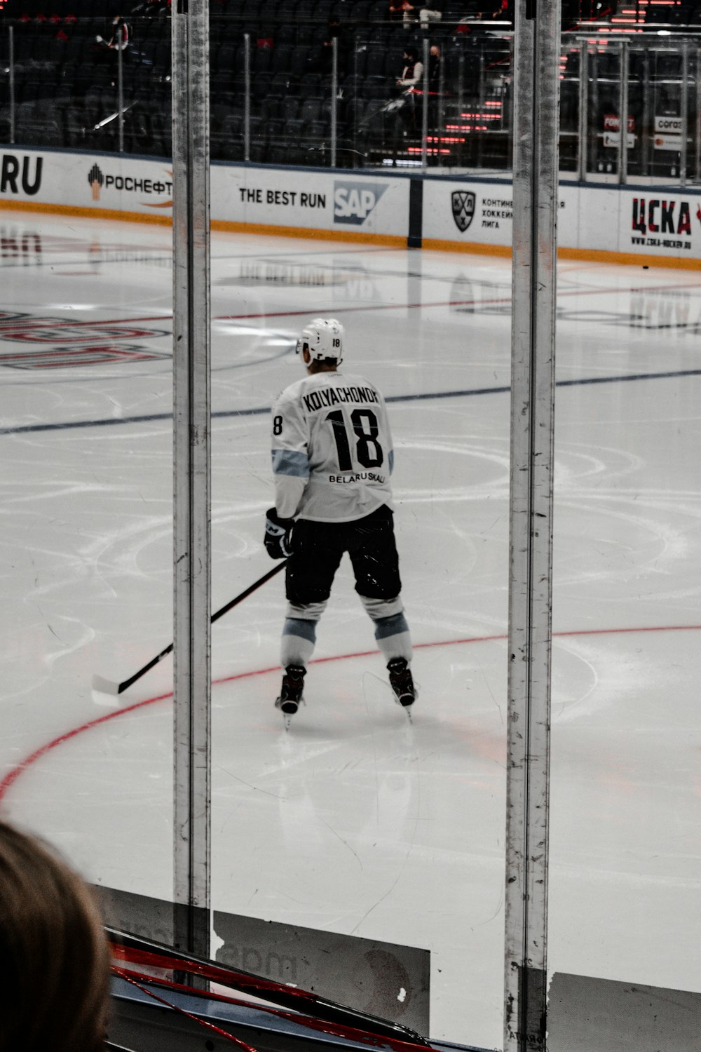 ice hockey players on ice hockey field