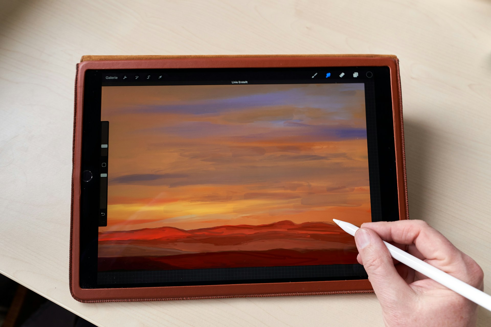 black ipad on white table