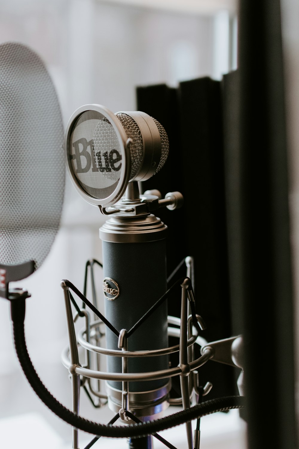 black and silver condenser microphone