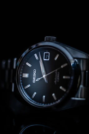 silver and black analog watch