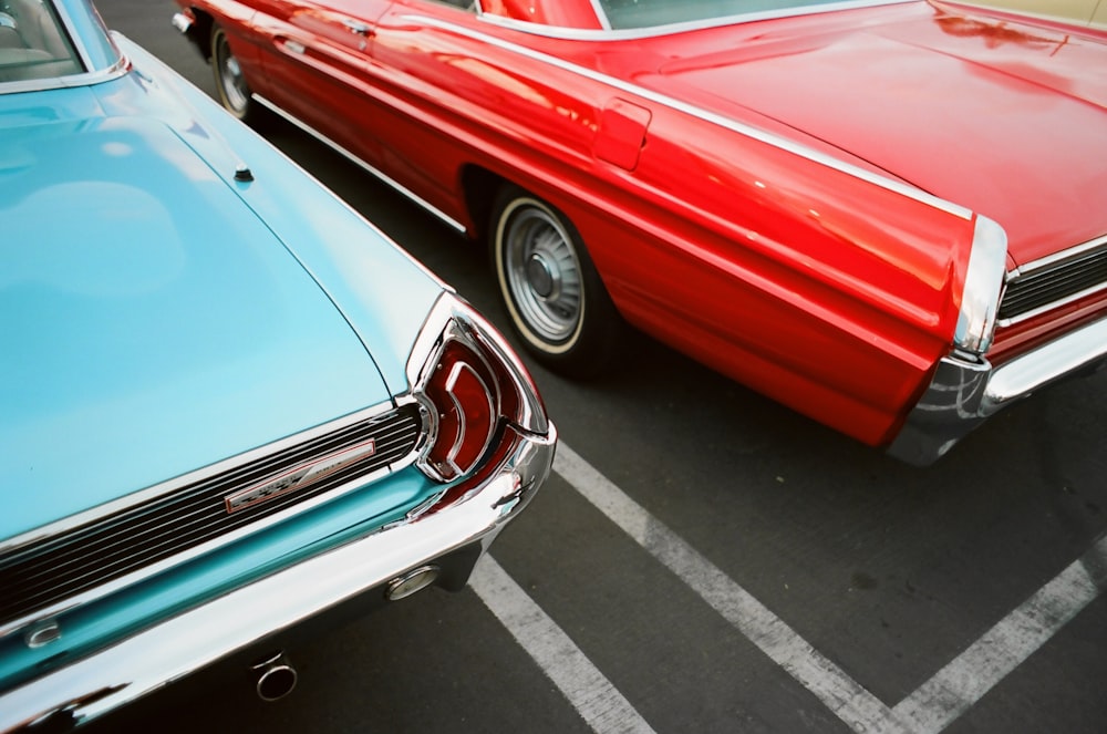 red and silver car on road