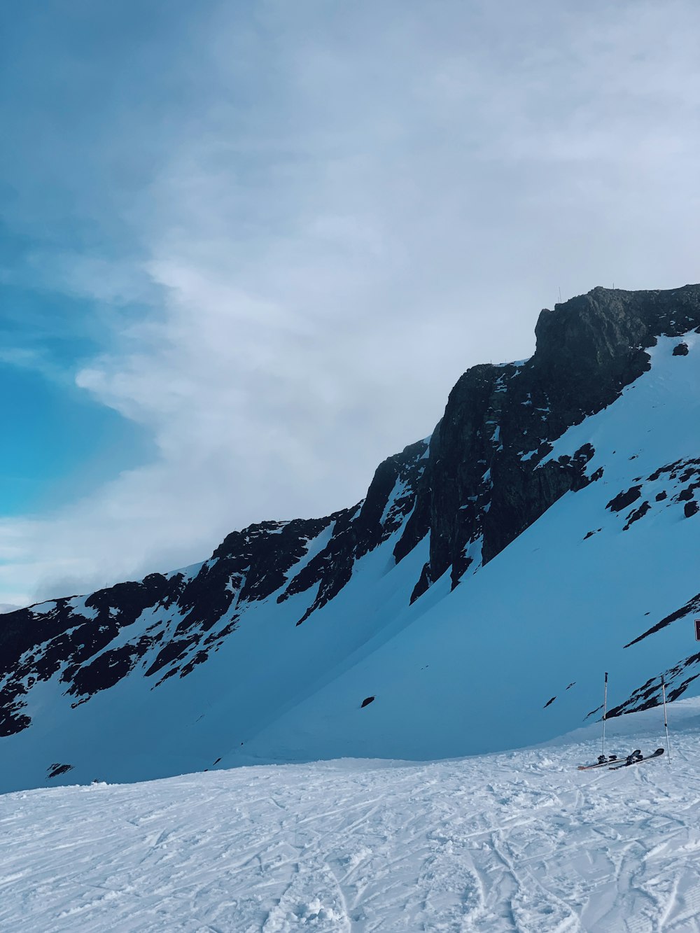 snow covered mountain under blue sky during daytime