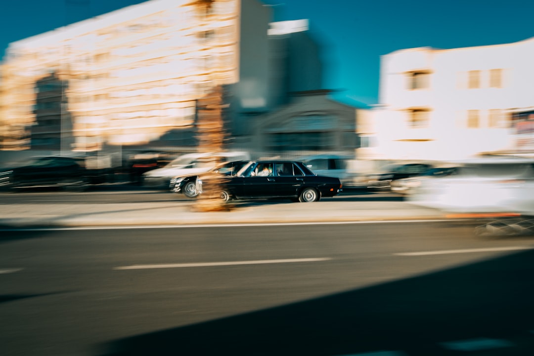 black suv on road during daytime