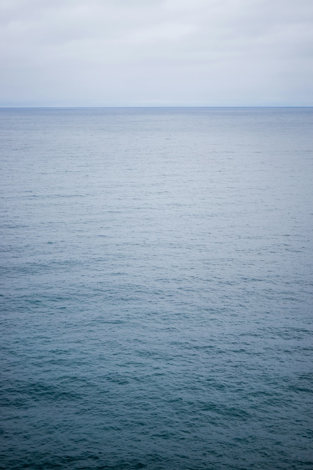 blue sea under blue sky during daytime