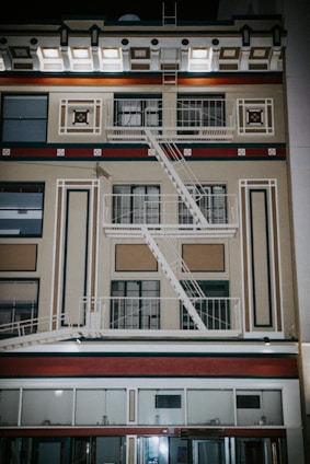 Prefabricated lighting system installed on a fire safety building exterior.