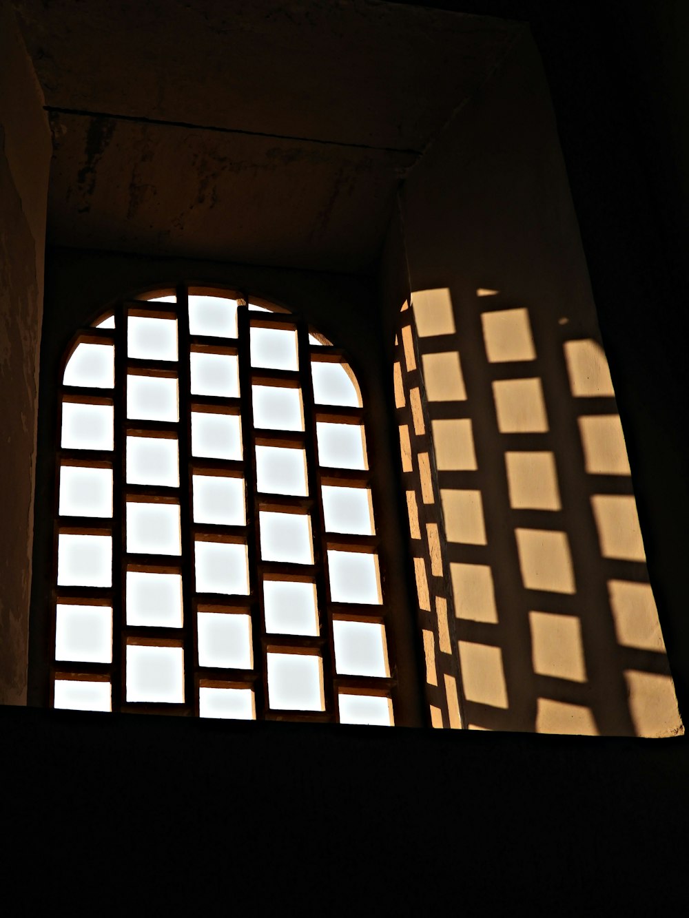 brown wooden framed glass window