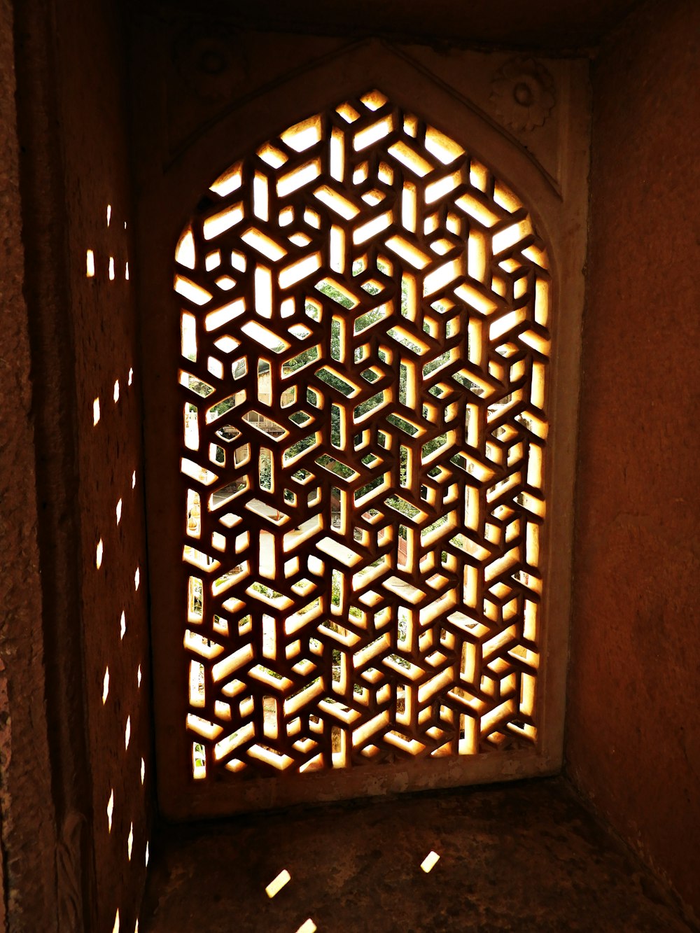 brown wooden frame on brown concrete wall