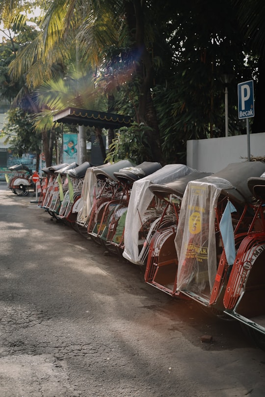 red and white plastic bags hanged on clothes line in Yogyakarta Indonesia