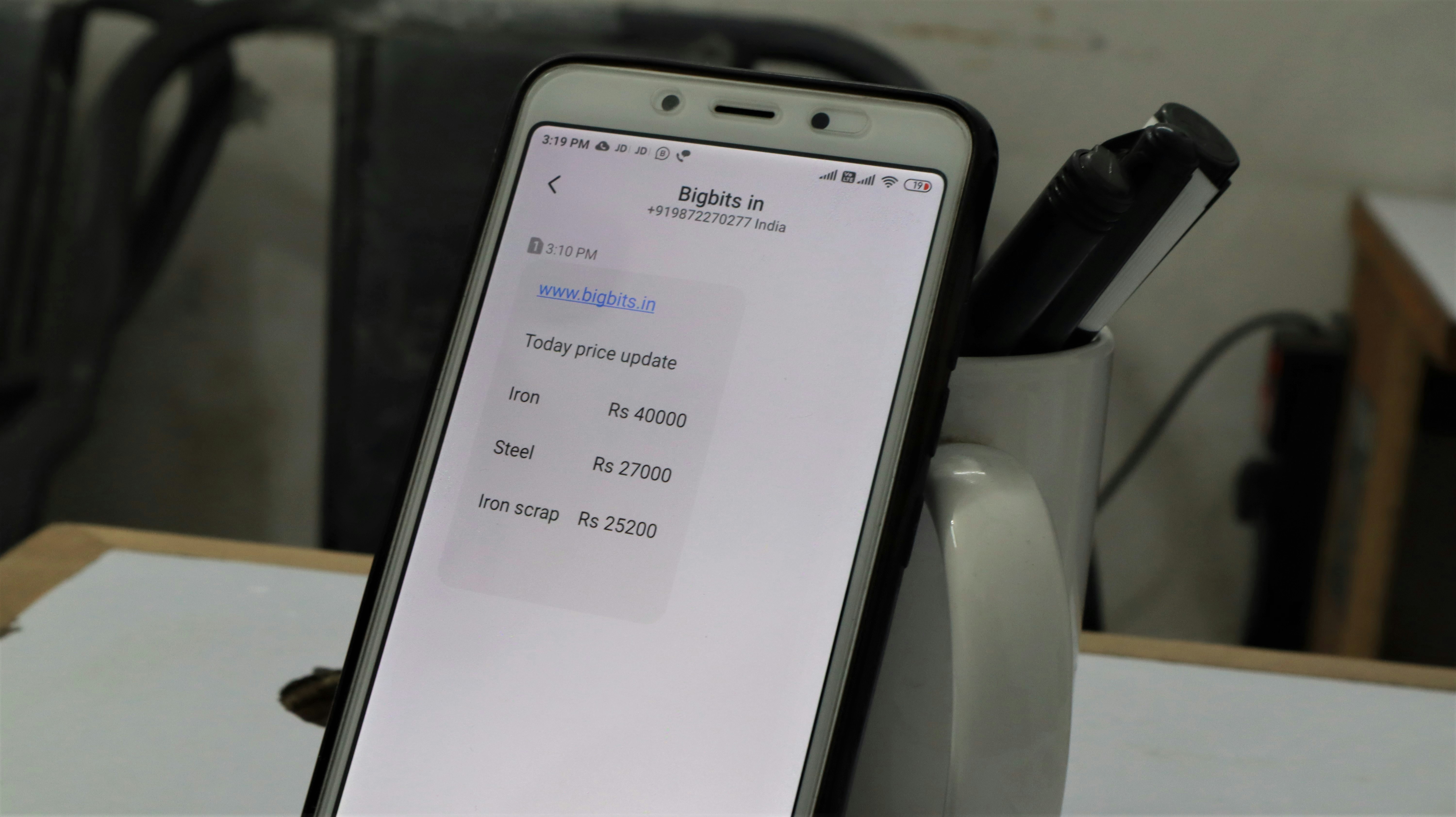 Smartphone displaying deal notifications and price alerts for electronics shopping