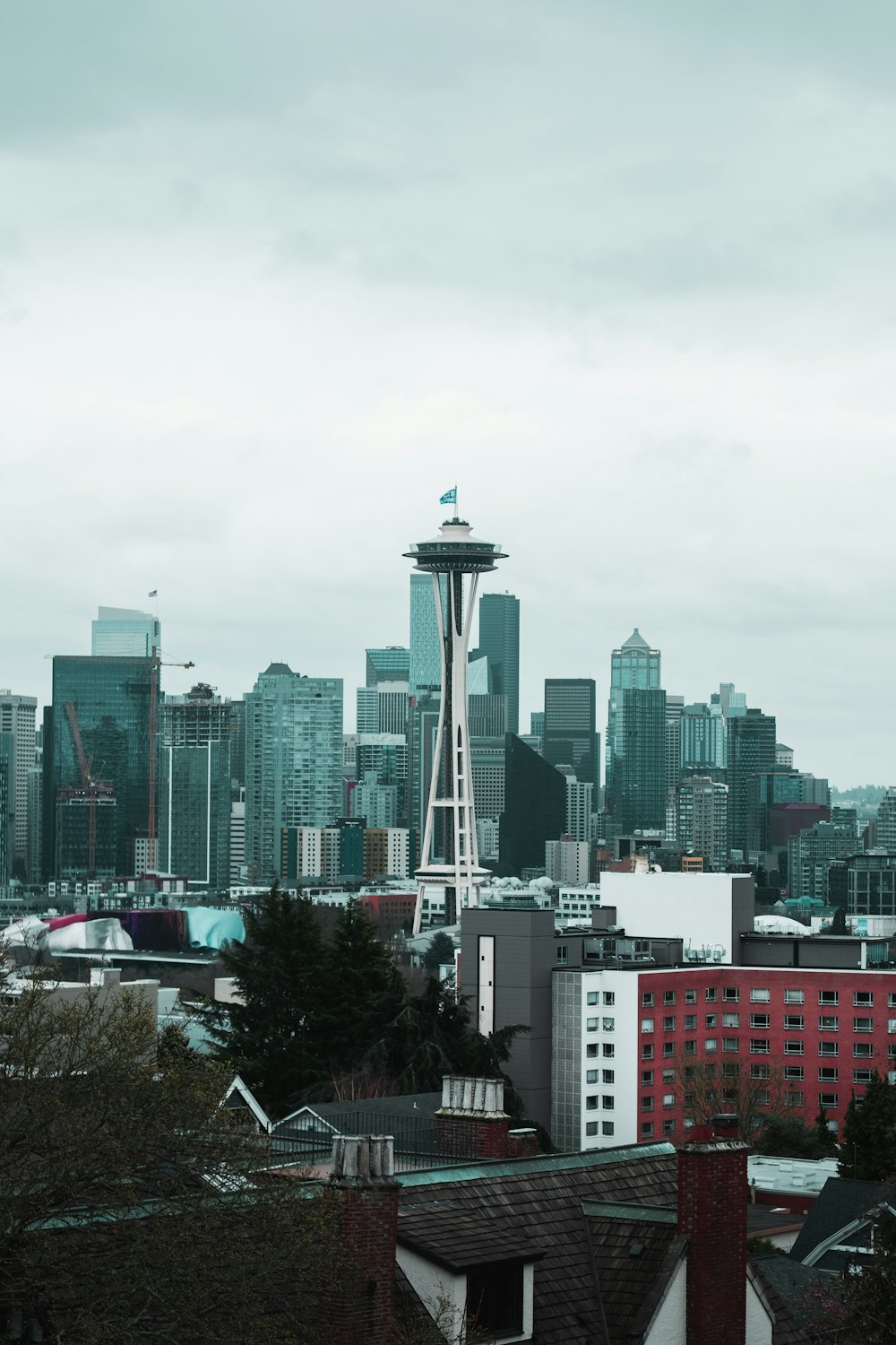 city skyline under white sky during daytime