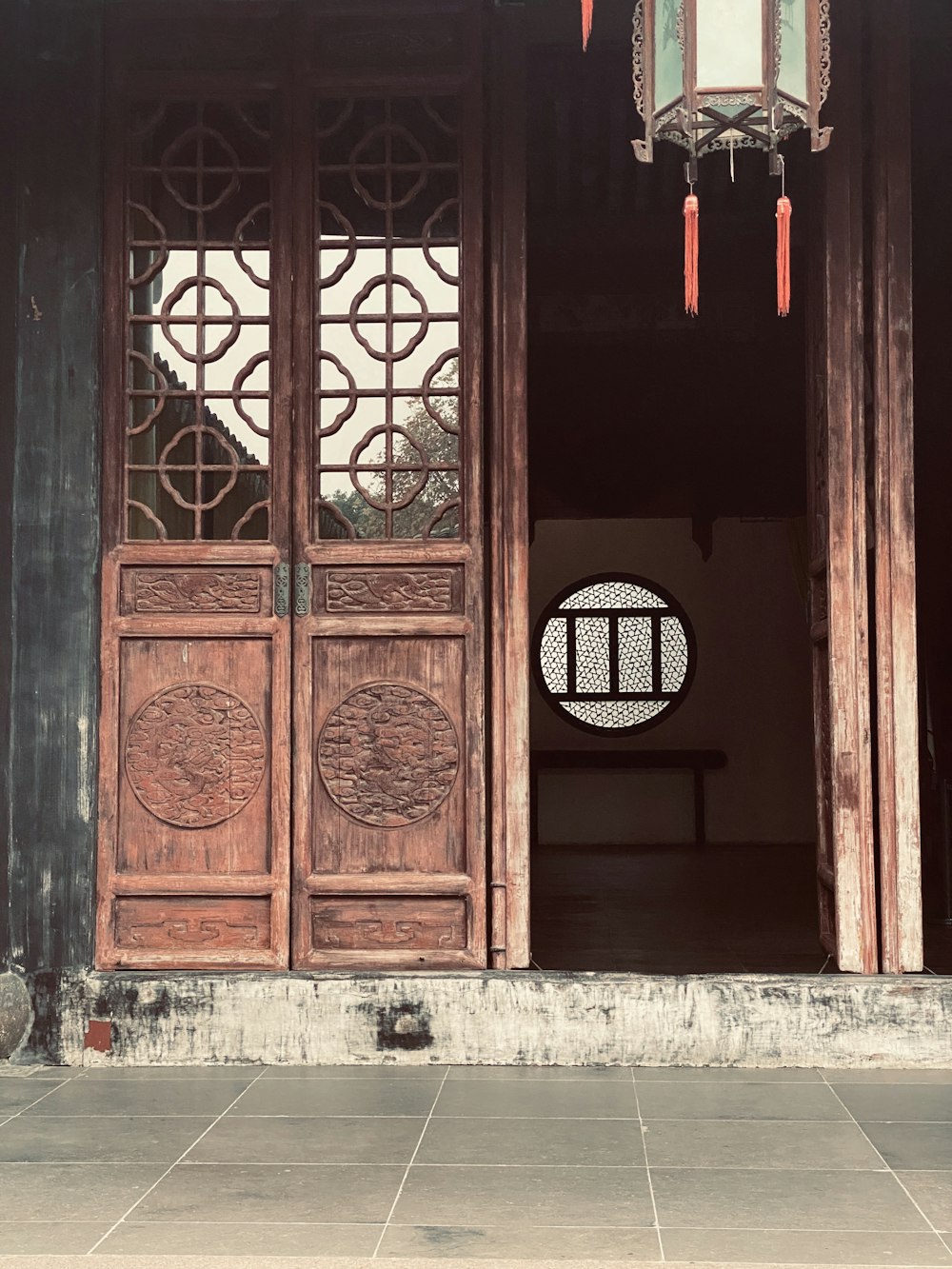 brown wooden door with glass