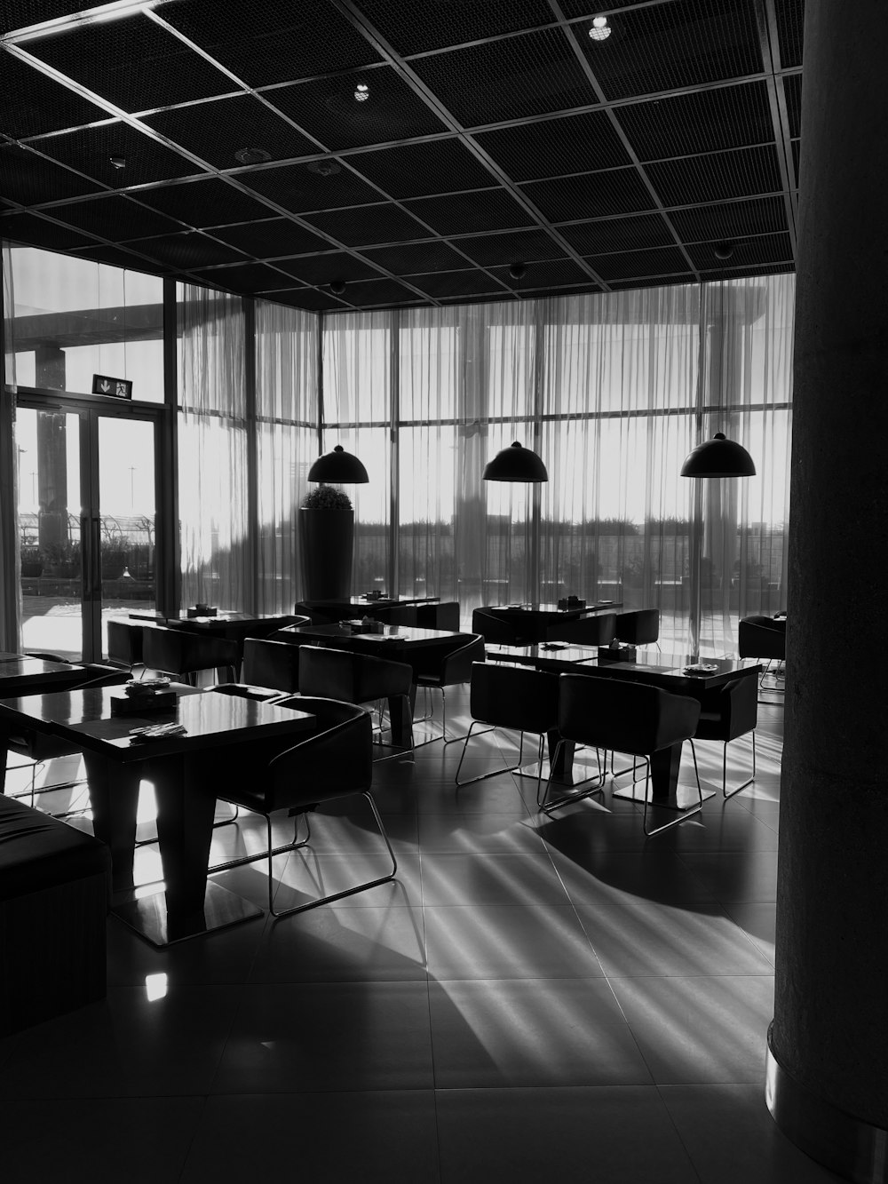 black wooden table and chairs