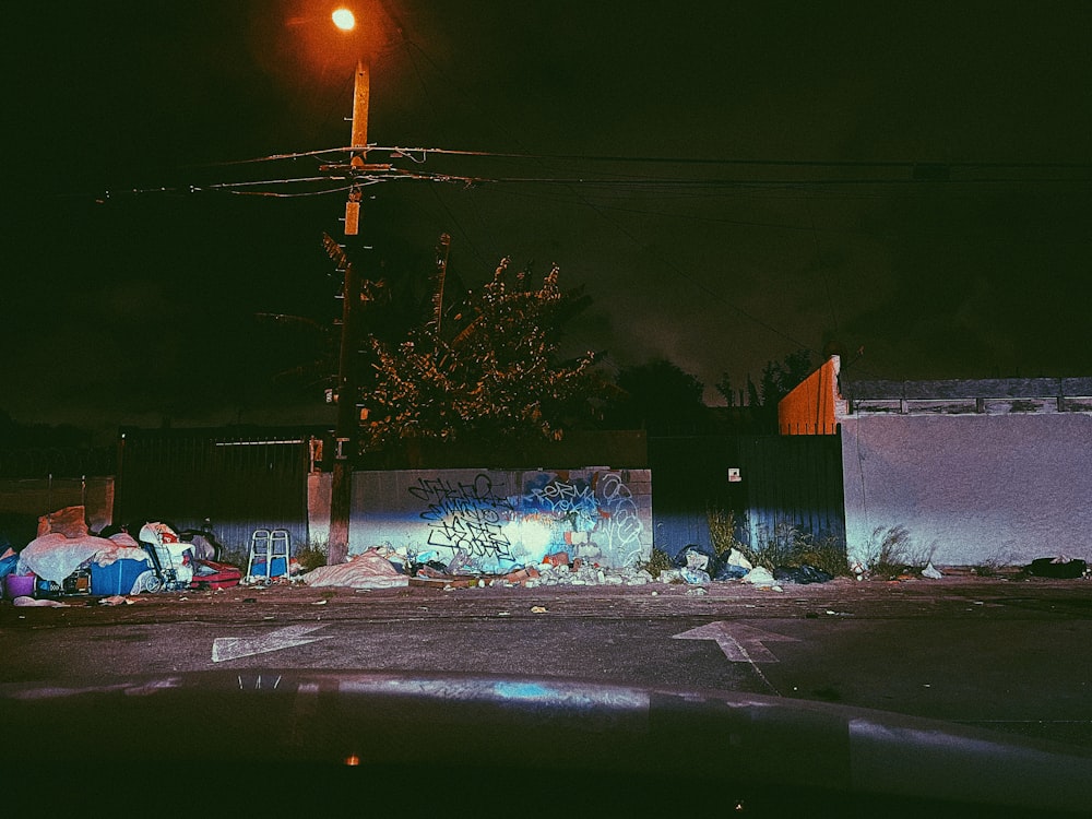 cars parked on side of the road during night time