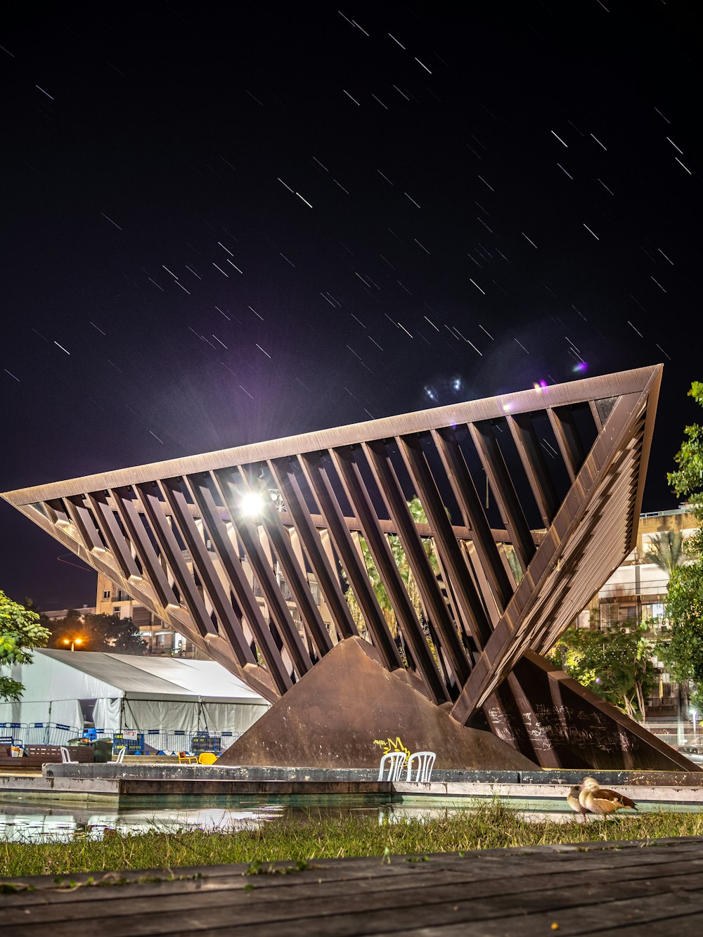 white and brown building under starry night